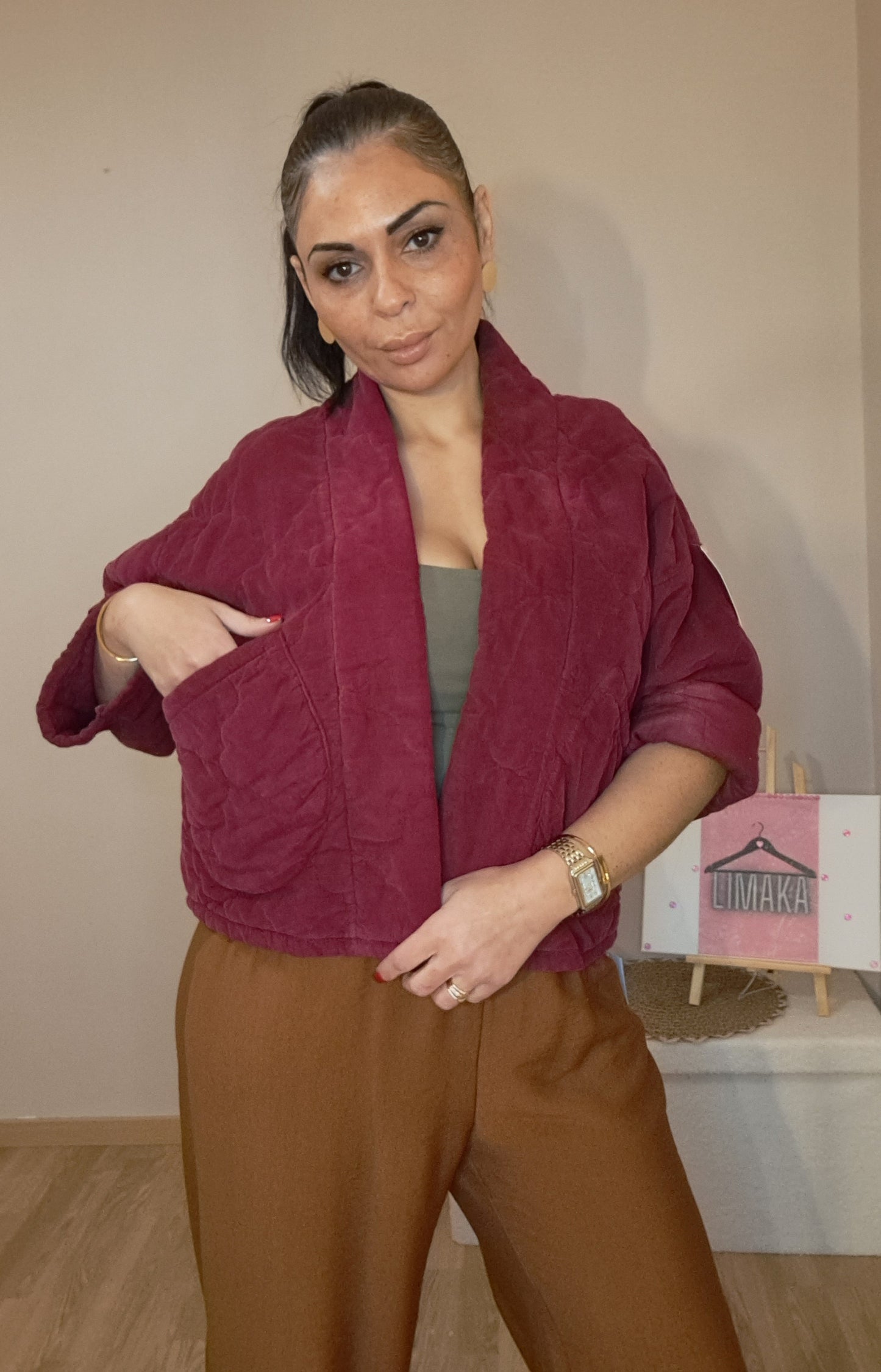 Veste à poches matelassée couleur bordeau