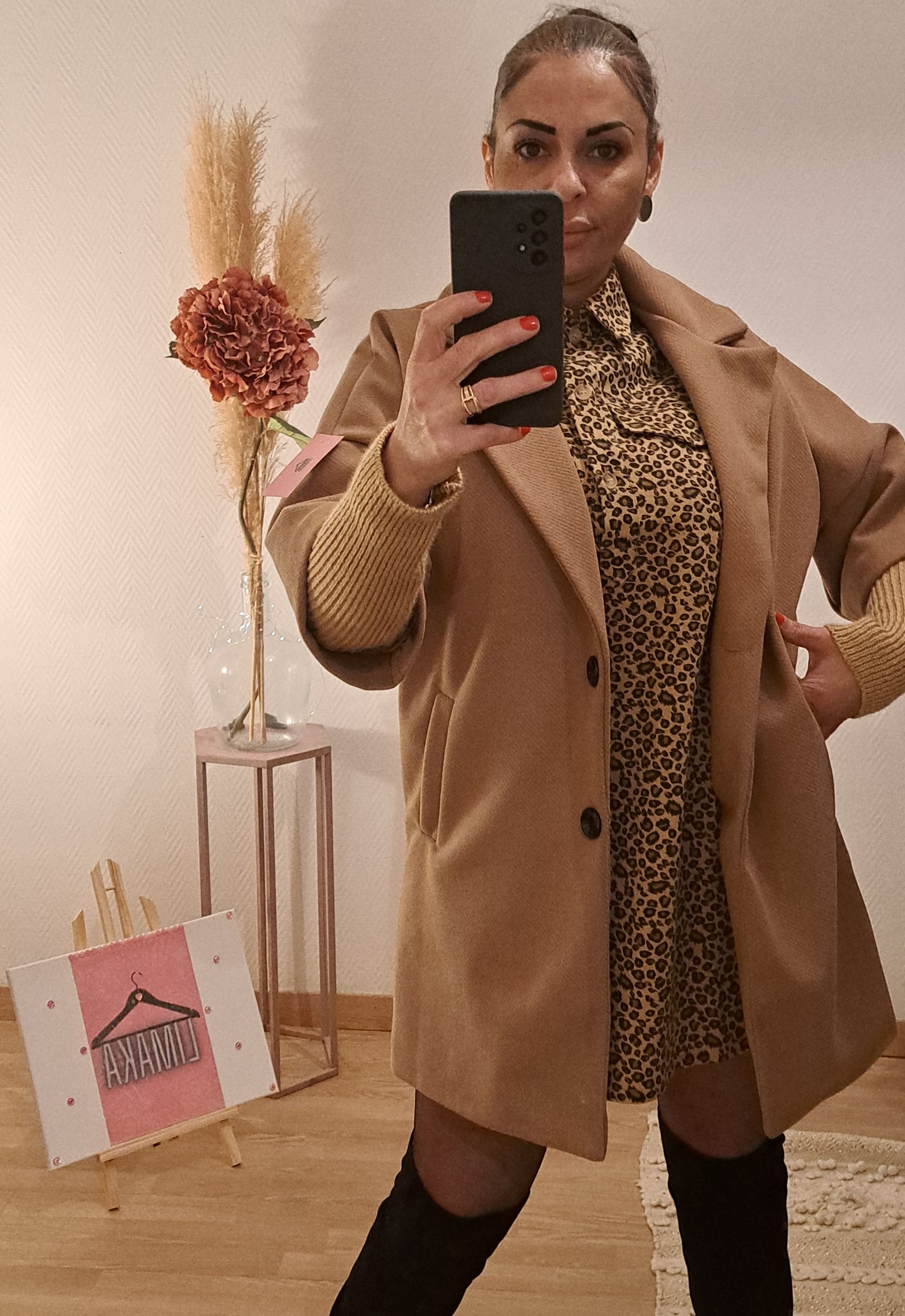 Manteau couleur marron effet pull au manche